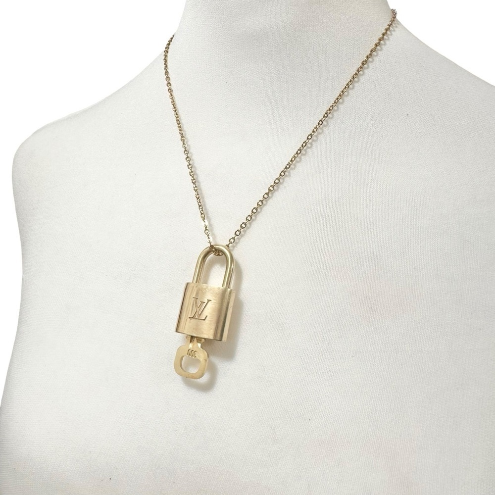 Authentic Louis Vuitton #325 Lock & Key Set on a 18K Gold Plated Chain Necklace